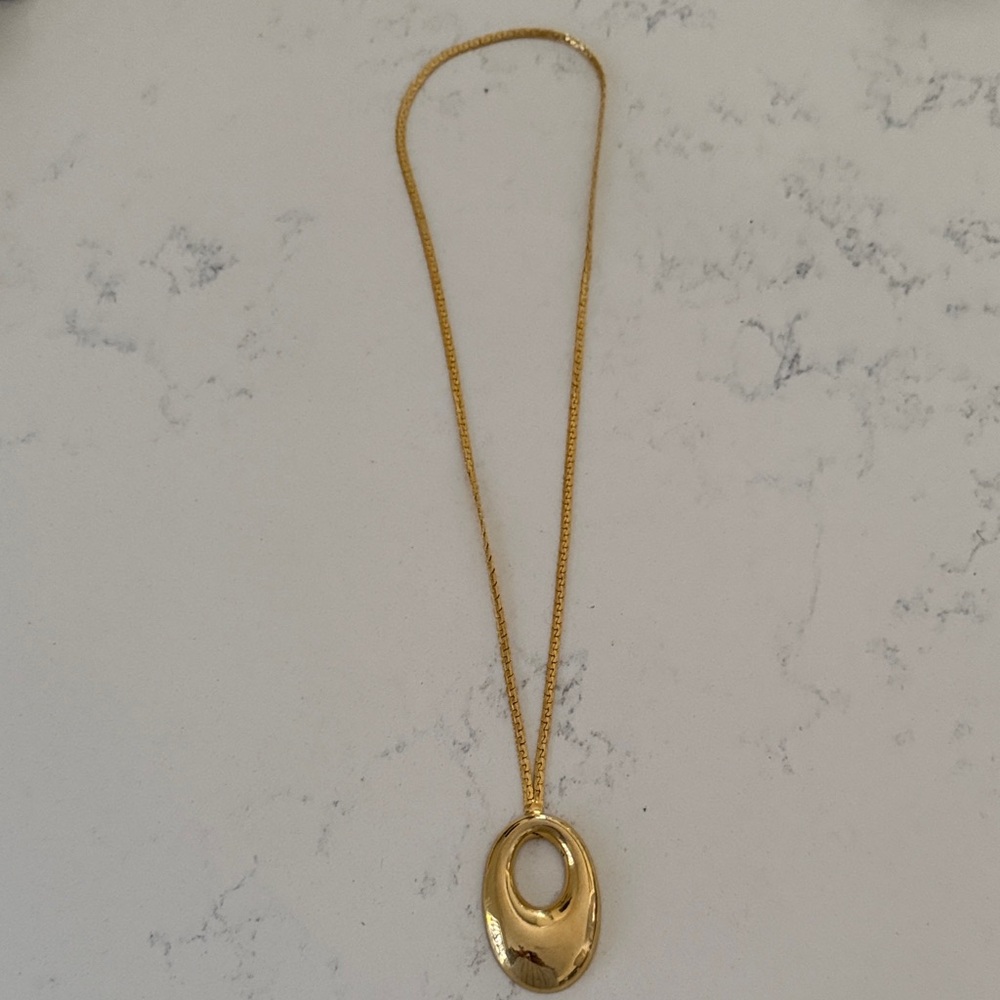 Elegant Gold Metal Pendant Necklace